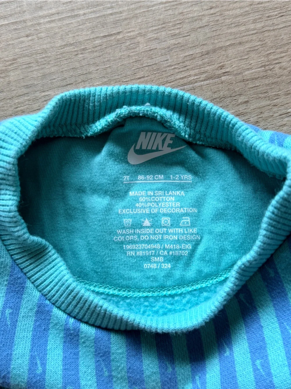 Nike Kids Teal & Blue Striped Long-Sleeve Bodysuit with Yellow Logo
